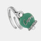 Anello in Metallo con campanella portafortuna color verde acqua, con scritta Capri a rilievo e cristalli bianchi
